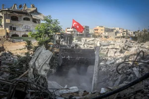 Turkish charities, in partnership with Khan Yunis municipal bulldozers, are starting to remove the rubble from Palestinian homes and open streets in the northern area of ​​Khan Yunis, in the southern Gaza Strip, after the Israeli army withdrew from some cities, following the ceasefire agreement between Israel and Hamas. October 23, 2025. Photo by Abed Rahim Khatib/FLASH90