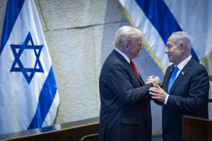 U.S. President Donald Trump with Israeli Prime Minister Benjamin Netanyahu during a special plenum session in honor of President Trump at the Knesset, Israel’s parliament in Jerusalem, on October 13, 2025. Photo by Yonatan Sindel/Flash90