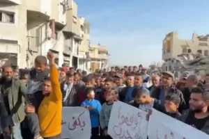 Palestinians shout anti-Hamas slogans at a protest in northern Gaza on Tuesday calling for an end to the war with Israel. Gaza Strip, Beit Lahia, March 26. 2025. Photo: Screenshot from a Facebook video.