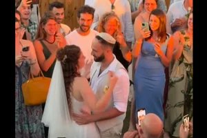 Shir Siegel and Yuval Bar at their wedding. (Photo: Screenshot/Youtube)