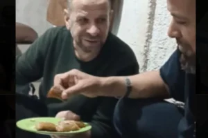 One of the images found by the IDF at Hamas’ command headquarters under the European Hospital in Khan Younis shows Rafah Brigade commander Muhammad Shabana enjoying lavish meals in the tunnel complex he shared with Mohammed Sinwar in the weeks before his death. (Photo: Social Media/X)