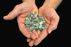 Ancient coins seized from the home of a Dimona resident suspected of illegal antiquities trade. (Photo: Israel Police)