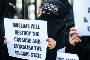 Illustrative image: Muslim demonstrators outside Regents Park Mosque in London, UK, on January 24, 2014. Photo: Shutterstock.