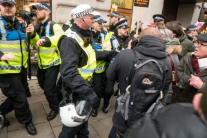 Illustrative: UK police officers in action during a protest in London, 1 February 2025. (Photo: Shutterstock)