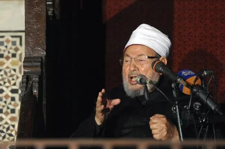 Egyptian Cleric Sheikh Yusuf al-Qaradawi, chairman of the International Union of Muslim Scholars, gives a speech during Friday prayers, before a protest against Syrian President Bashar al-Assad, at Al Azhar mosque in old Cairo December 28, 2012. (Photo: REUTERS/Amr Abdallah Dalsh)