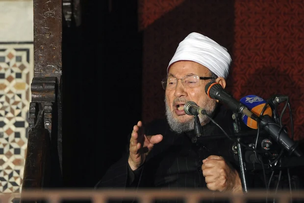 Egyptian Cleric Sheikh Yusuf al-Qaradawi, chairman of the International Union of Muslim Scholars, gives a speech during Friday prayers, before a protest against Syrian President Bashar al-Assad, at Al Azhar mosque in old Cairo December 28, 2012. (Photo: REUTERS/Amr Abdallah Dalsh)