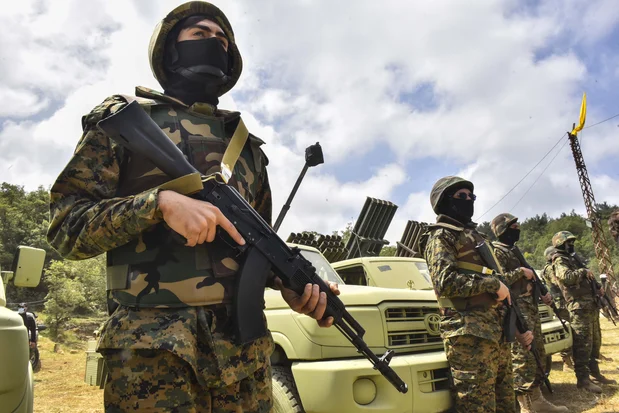 Lebanese Hezbollah fighters are taking part in cross-border raids, part of a large-scale military exercise, in Aaramta bordering Israel on May 21, 2023 ahead of the anniversary of Israel's withdrawal from southern Lebanon in 2000. (Photo: Fadel Itani/NurPhoto via Reuters)