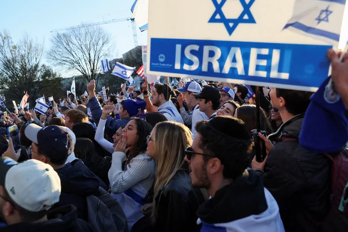 Jewish Americans and supporters of Israel gather in solidarity with Israel and protest against antisemitism, amid the ongoing conflict between Israel and the Palestinian group Hamas, during a rally on the National Mall in Washington