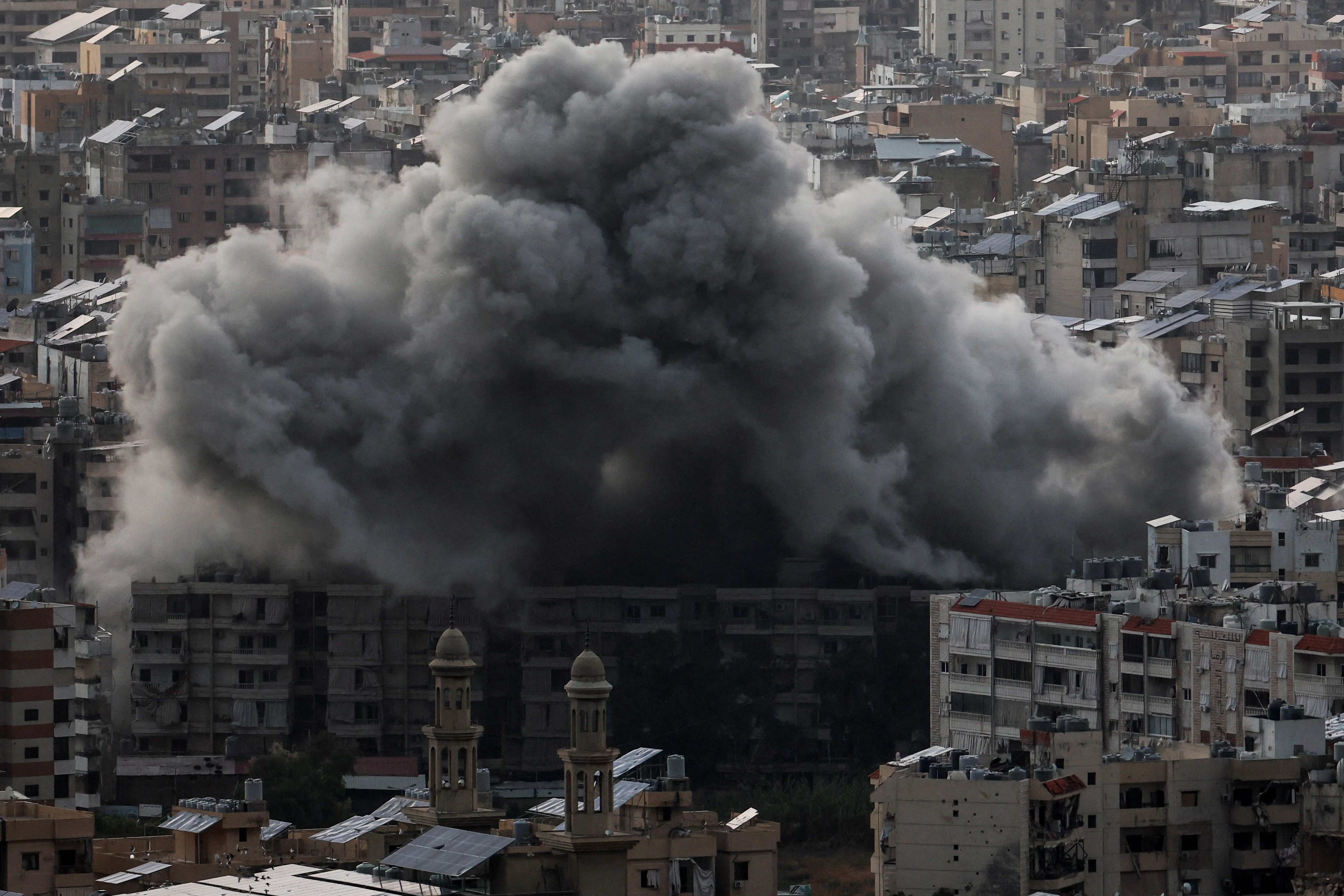 Smoke billows over Beirut's southern suburbs after an Israeli strike, amid the ongoing hostilities between Hezbollah and Israeli forces, as seen from Baabda, Lebanon, November 24, 2024. REUTERS/Mohamed Azakir