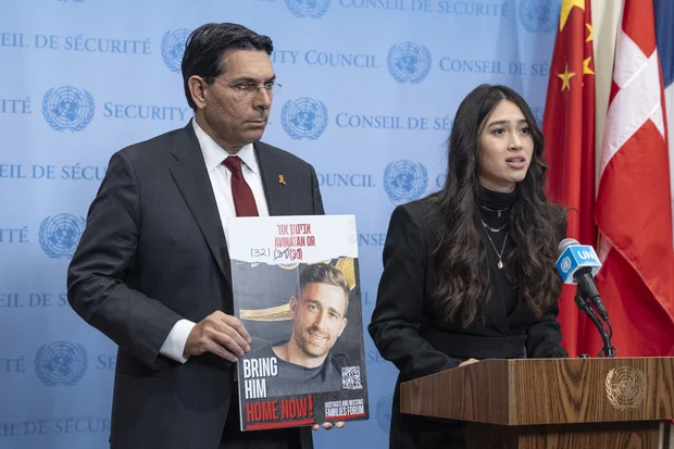 Former hostage Noa Argamani joins Israeli Ambassador Danny Danon at a UN press conference following a Security Council meeting on the Middle East, February 25, 2025. Photo: Lev Radin/Sipa via Reuters.