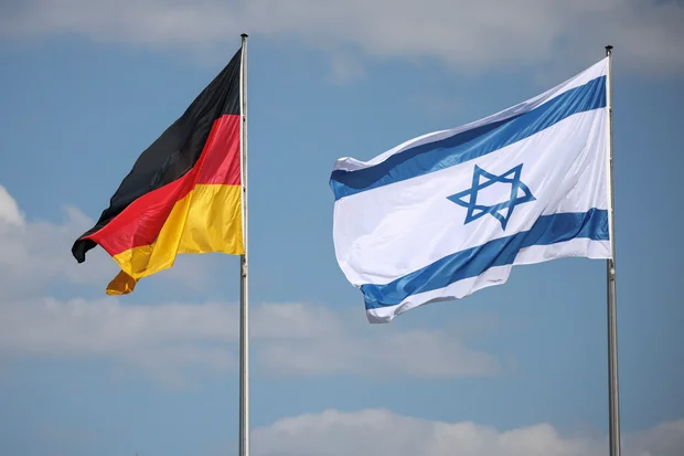 A German and Israeli flag fly, on the day Chancellor Friedrich Merz meets with Israeli President Isaac Herzog for talks, in Berlin, Germany, May 12, 2025. REUTERS