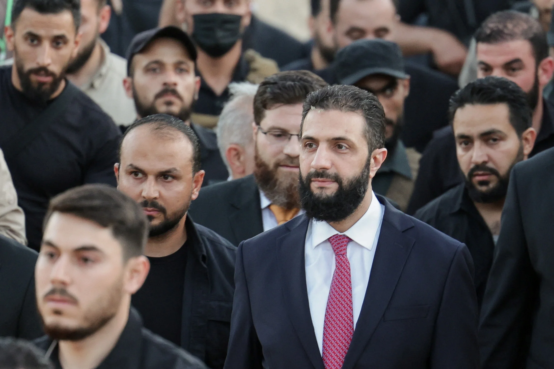 Syria's interim President Ahmed al-Sharaa attends the 