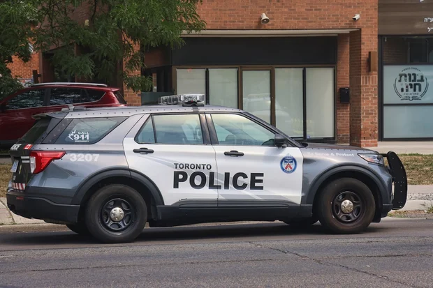 A Toronto police vehicle parks outside a Jewish school in Toronto, Ontario, Canada, on August 16, 2025. (Photo: Creative Touch Imaging Ltd via Reuters)