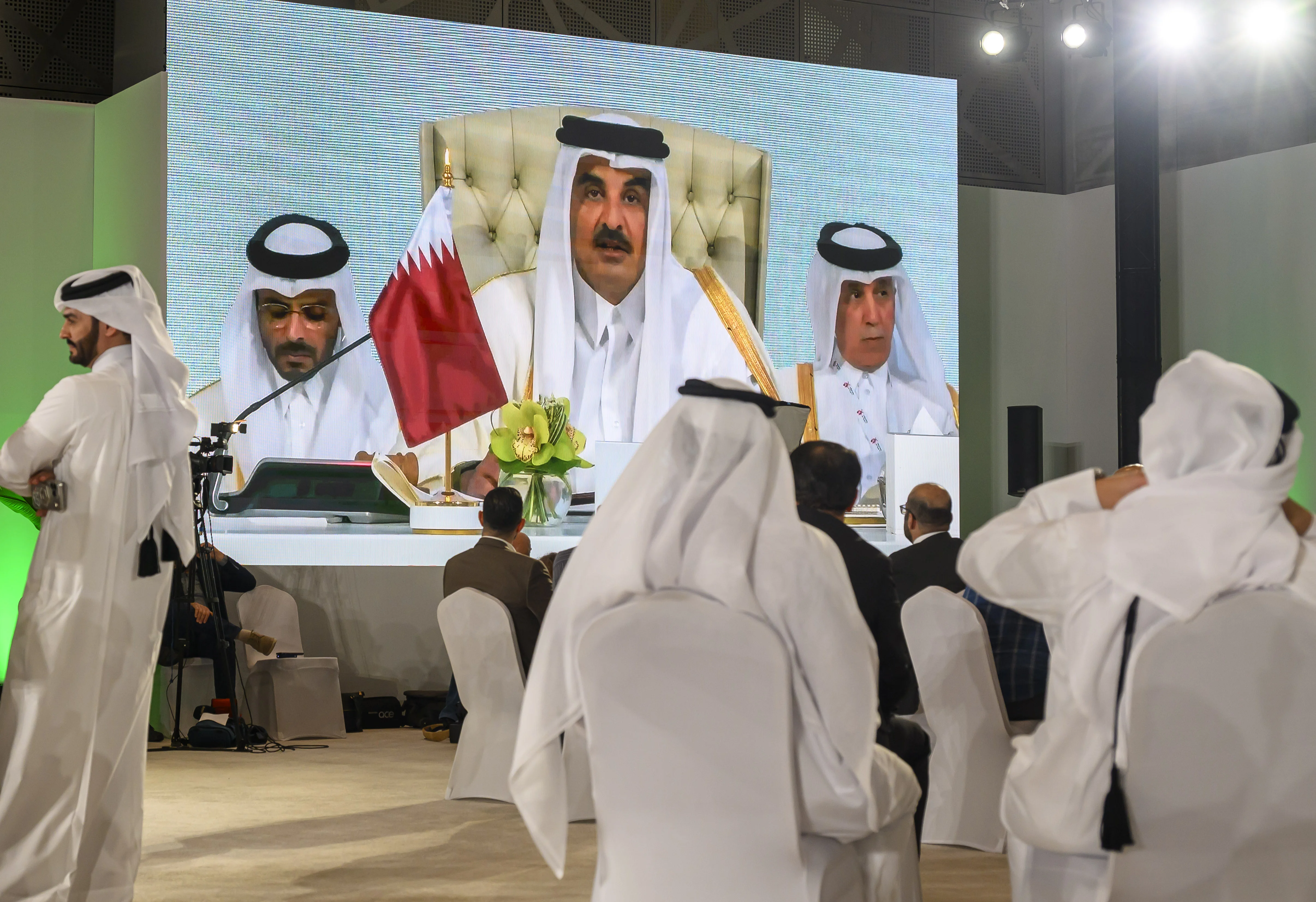 Journalists watch a screen at the media center as Sheikh Tamim bin Hamad Al Thani, the emir of Qatar, speaks during the opening of the emergency Arab-Islamic summit to discuss the Israeli attack on Hamas on the Gulf country's soil in Doha, Qatar, on September 15, 2025. Photo: Reuters Connect by Noushad Thekkayil