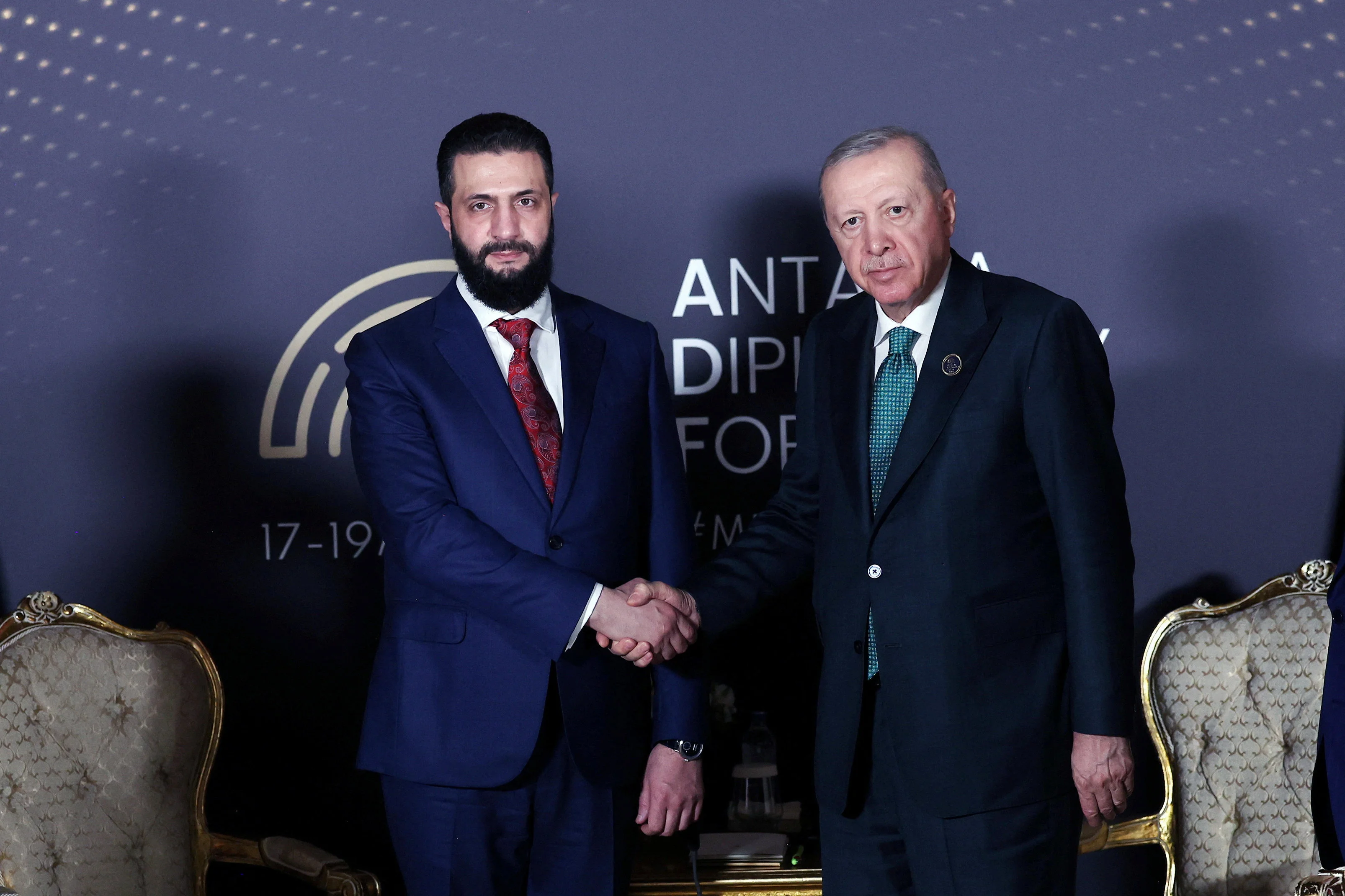 Turkey's President Tayyip Erdogan meets with Syria's President Ahmed al-Sharaa on the sidelines of Antalya Diplomacy Forum in Antalya, Turkey