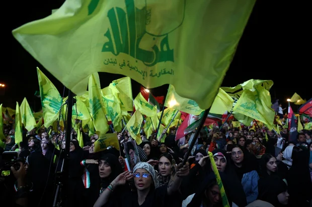 Iranians hold Hezbollah flags during a pro-government rally in Tehran, Iran, June 1, 2026. (Photo: Majid Asgaripour/WANA via REUTERS)