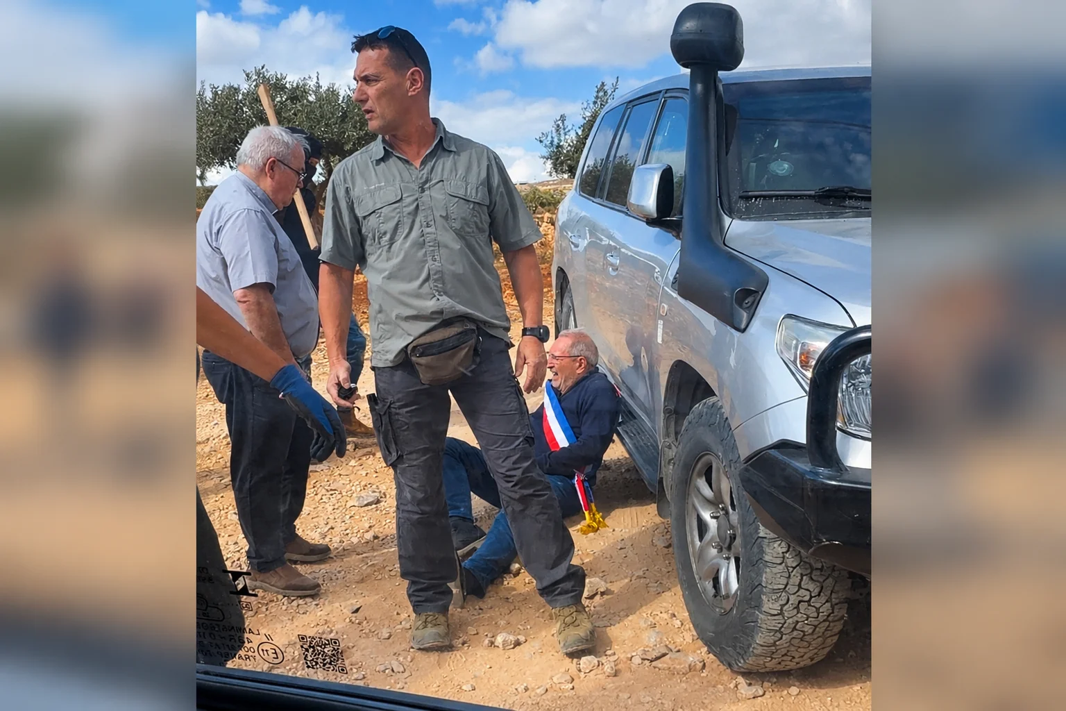 A man reacts on the ground where Belgium's foreign minister says Israeli settlers attacked Palestinians, Catholic representatives and Western diplomats and officials, in Taybeh, October 17, 2026. (Photo: Screenshot from a video obtained from social media. Amit Orfali/via REUTERS)