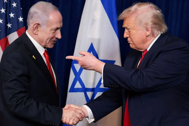 U.S. President Donald Trump points his finger towards Israeli Prime Minister Benjamin Netanyahu as they shake hands during a press conference after meeting at Trump’s Mar-a-Lago club in Palm Beach, Florida, U.S. REUTERS/Jonathan Ernst/File Photo