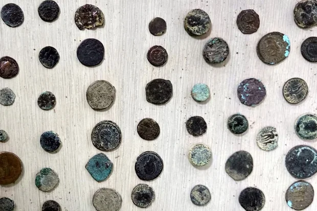 Ancient coins seized during raid on home of suspected antiquities smuggler in the Jordan Valley, July 28, 2026. (Photo: Civil Administration’s Archaeology Unit)