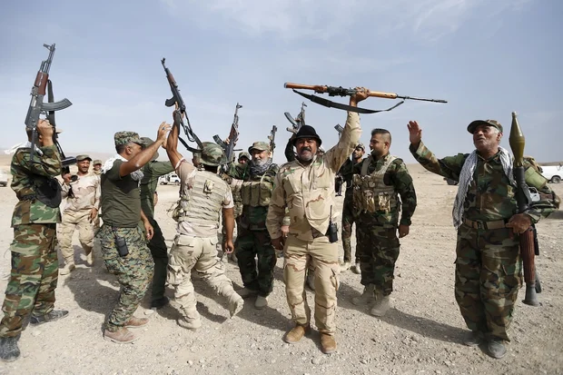 Illustrative - Shi'ite militia fighters in al-Fatha, northeast of Baiji, Iraq, October 18, 2015. (Photo: REUTERS/Thaier Al-Sudani)