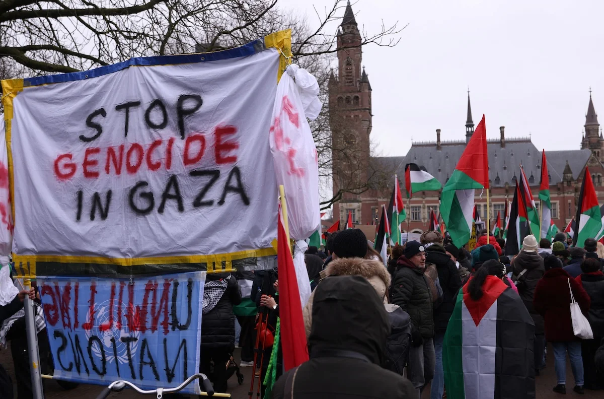 Pro-Palestinian protesters gather near the International Court of Justice (ICJ) as judges hear a request for emergency measures by South Africa to order Israel
