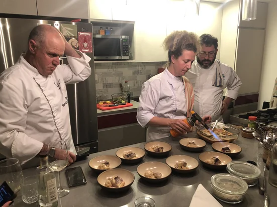 Chefs_for_Peace_working_in_the_kitchen_together_Photo_by_Carrie_Hart_2.jpg