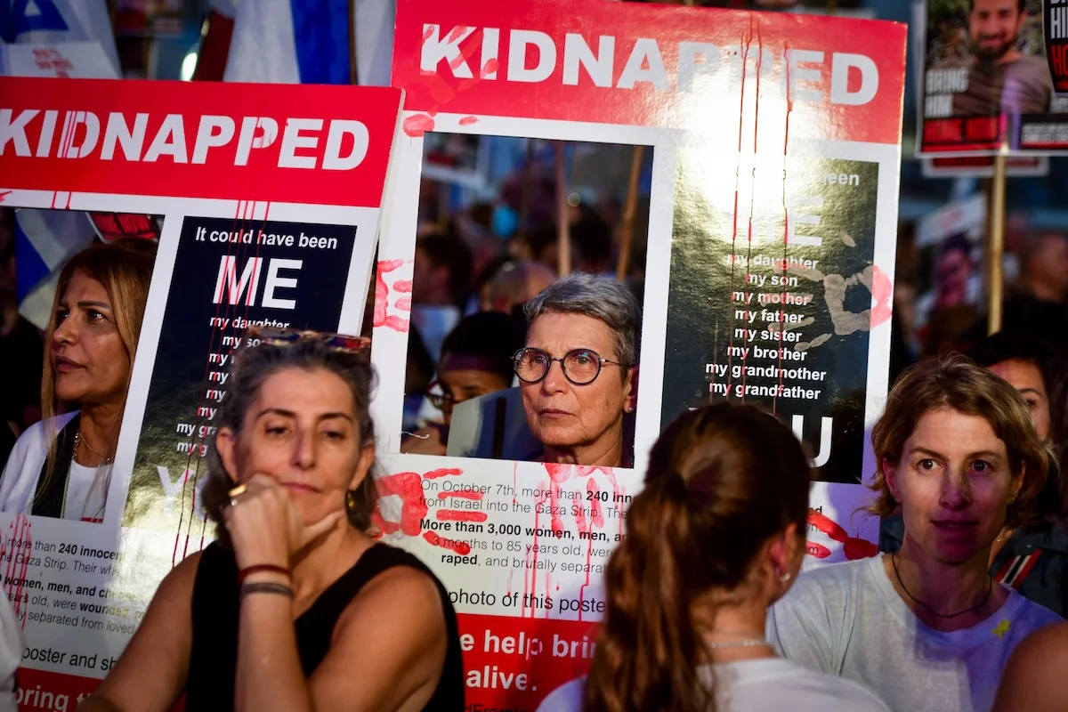 Israelis attend a rally calling for the release of Israelis held hostage by Hamas terrorists in Gaza, at 