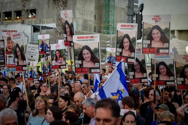 Israelis attend a rally calling for the release of Israelis held hostage by Hamas terrorists in Gaza, at 
