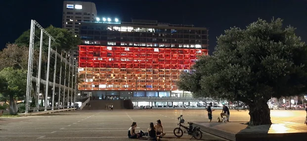 Showing solidarity, Tel Aviv-Yafo city hall lit up with the German flag