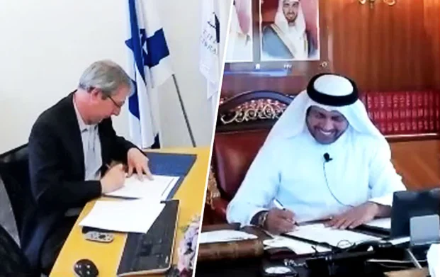 National_Archives_of_UAE_Director_Dr._Abdulla_M._Alraisi_and_National_Library_of_Israel_Director_Oren_Weinberg_signing_MOU.jpg