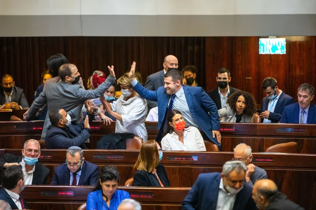 Drama in the Knesset as coalition passes first budget in three years