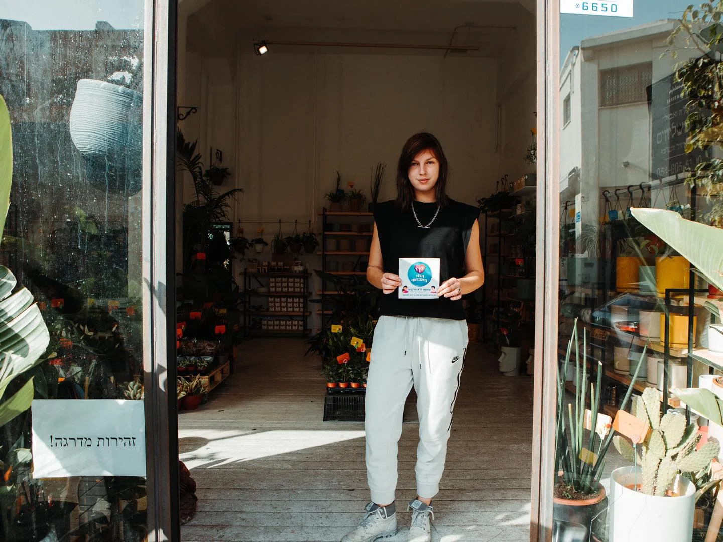 Shop owner presenting the 