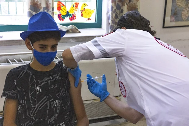 Israel recommends third shot - ahead of Pfizer approval for emergency use