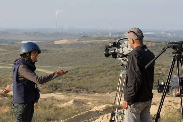 Foreign press from around the world broadcast live from a hill near the southern Israeli town of Sderot overseeing the Gaza strip as the Israeli army operate inside. Jan 05, 2009. Photo by Kobi Gideon / FLASH90.