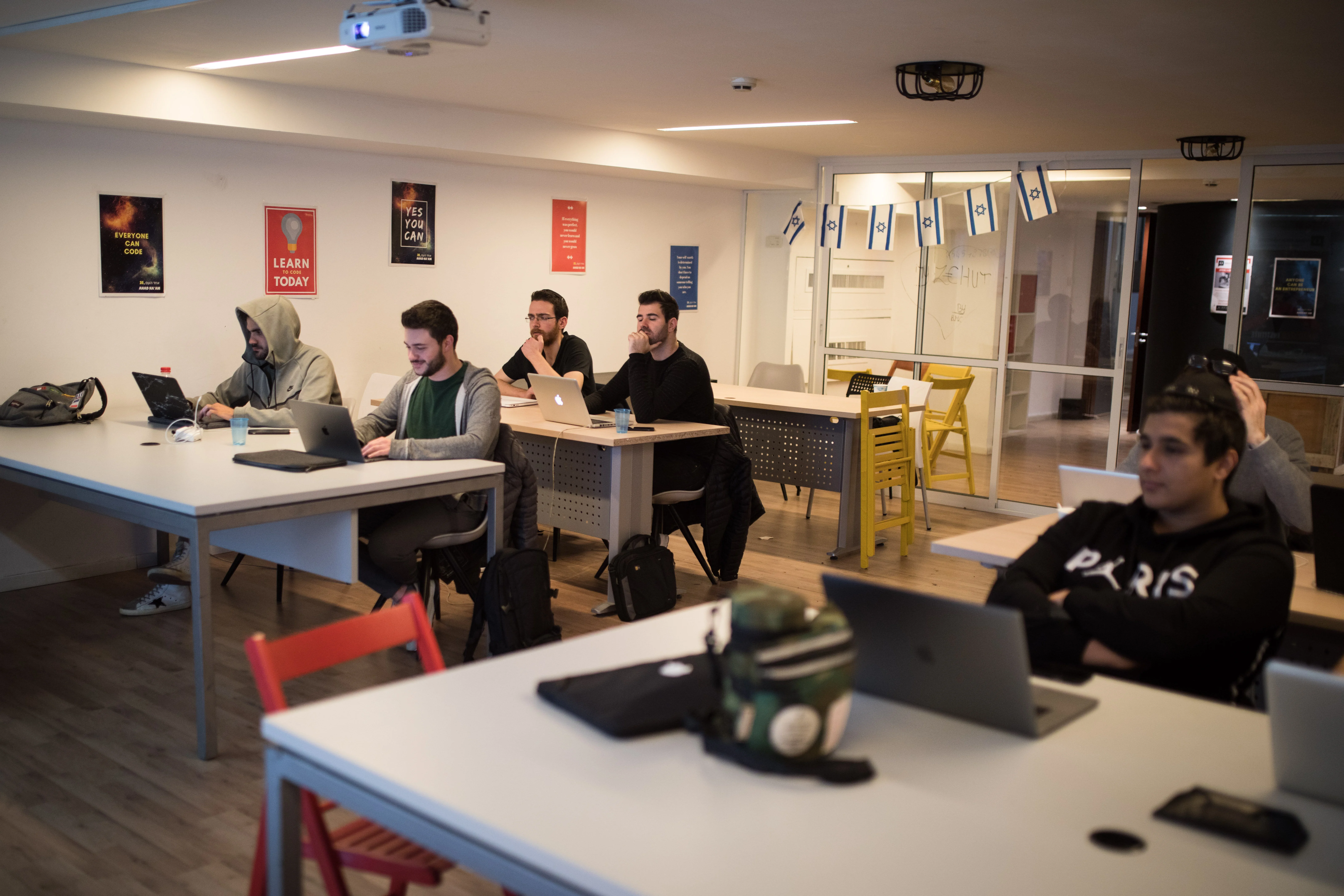 French orthodox Jewish students during a class instructing coding, at the Developers Institute Coding Bootcamp, in Tel Aviv on February 21, 2019. Photo by Hadas Parush/Flash90