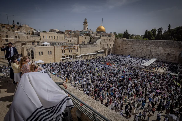 Jewish worshippers attend the Cohen Benediction priestly blessing at the Western Wall in Jerusalem's Old City, during the Jewish holiday of Passover, April 25, 2024. Photo by Chaim Goldberg/Flash90