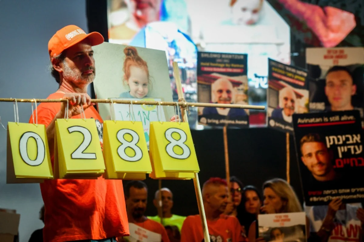 Israelis attend a rally calling for the release of Israelis held hostage by Hamas terrorists in Gaza, at 