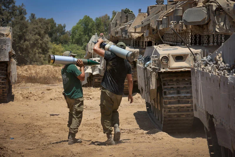 Israeli soldiers seen at a staging area near the Israeli-Gaza border, southern Israel, July 21, 2024. Photo by Oren Cohen/Flash90