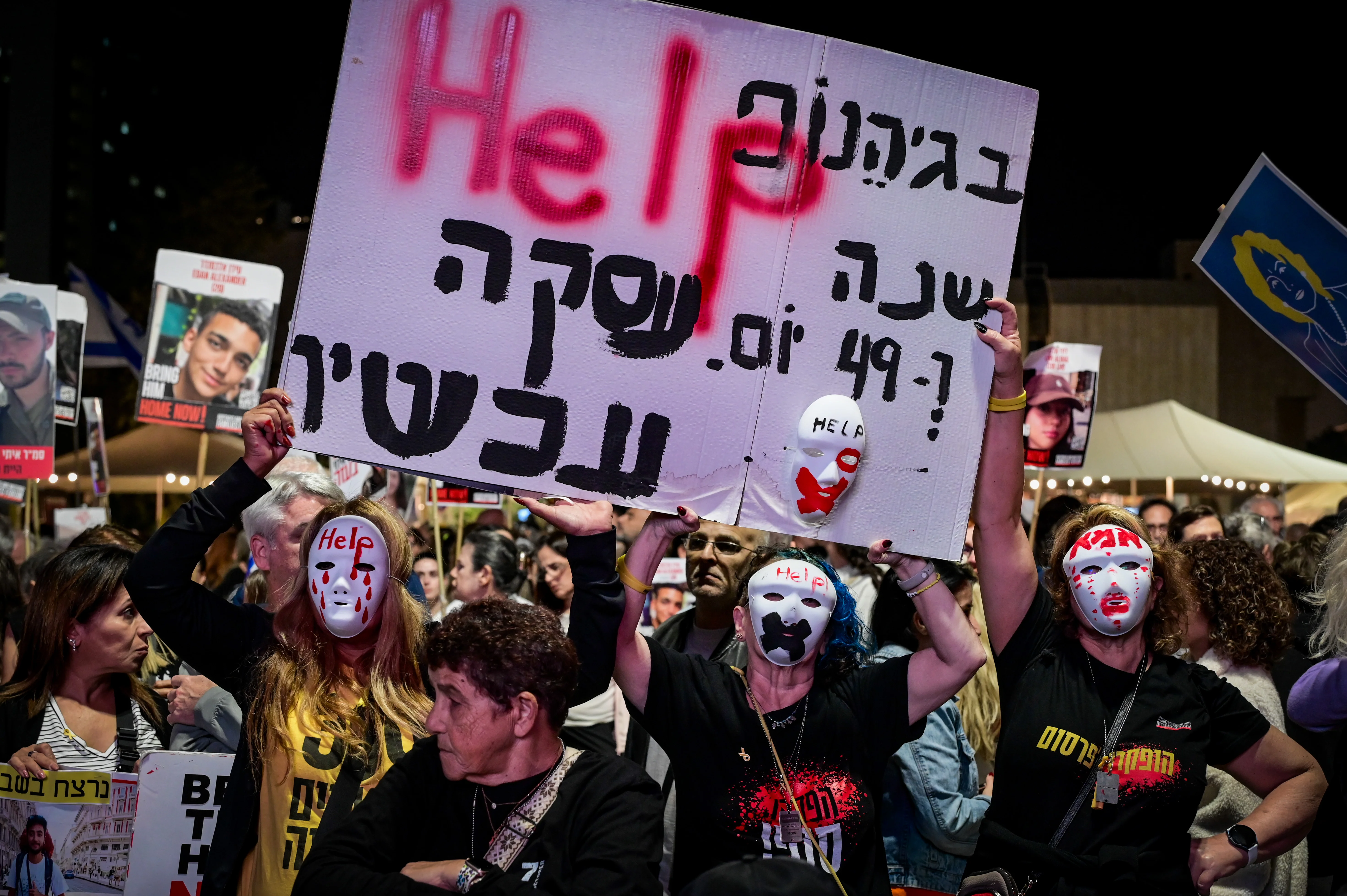 Israelis attend a rally calling for the release of Israelis held hostage by Hamas terrorists in Gaza, at 