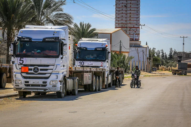Palestinian trucks parked near the Kerem Shalom crossing, east of the city of Rafah, in the southern Gaza Strip, after Israel has stopped the entry of all humanitarian aid into Gaza, March 2, 2025. Photo by Abed Rahim Khatib/Flash90