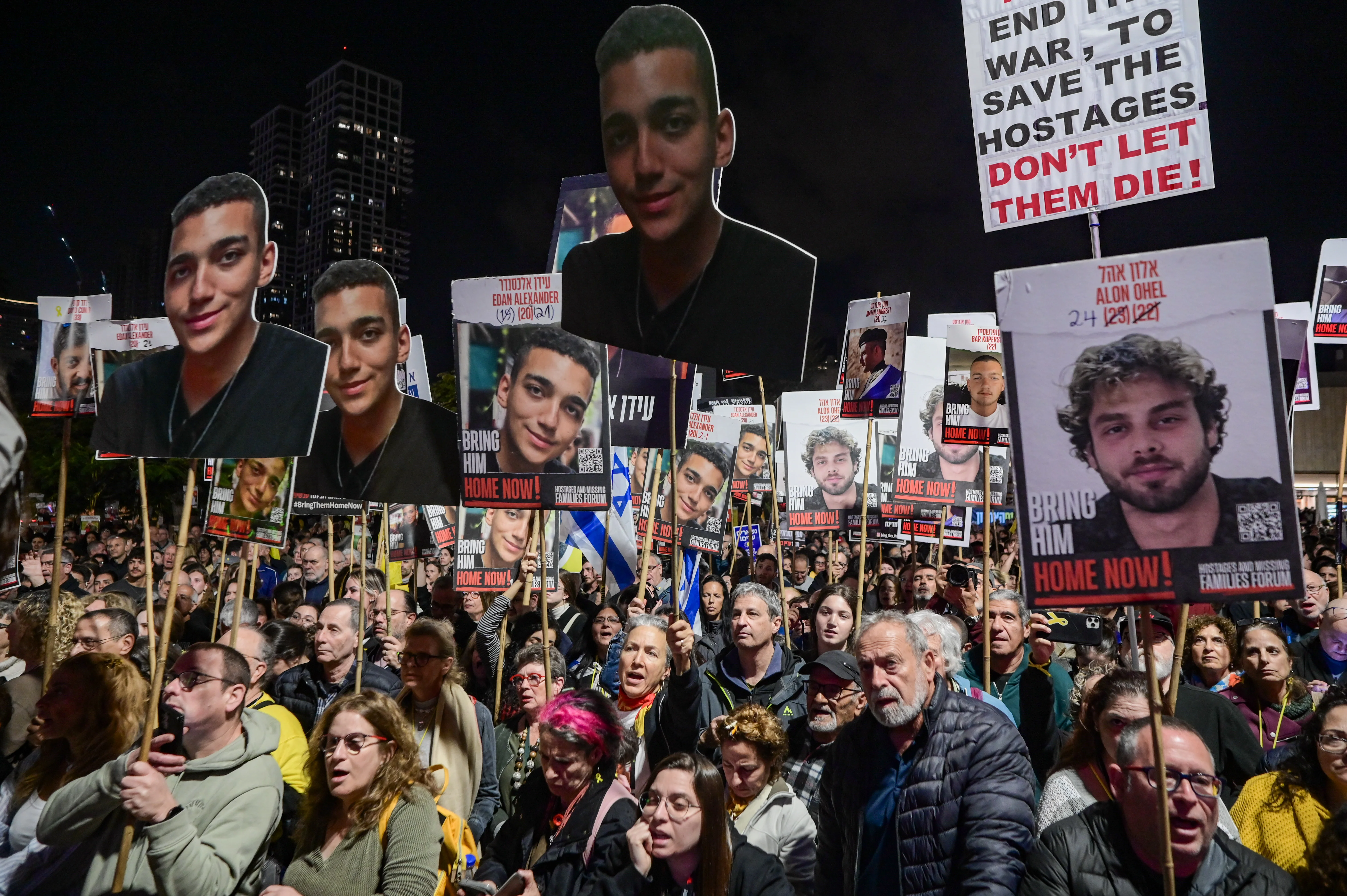 Israelis attend a rally calling for the release of Israelis held hostage by Hamas terrorists in Gaza, at 