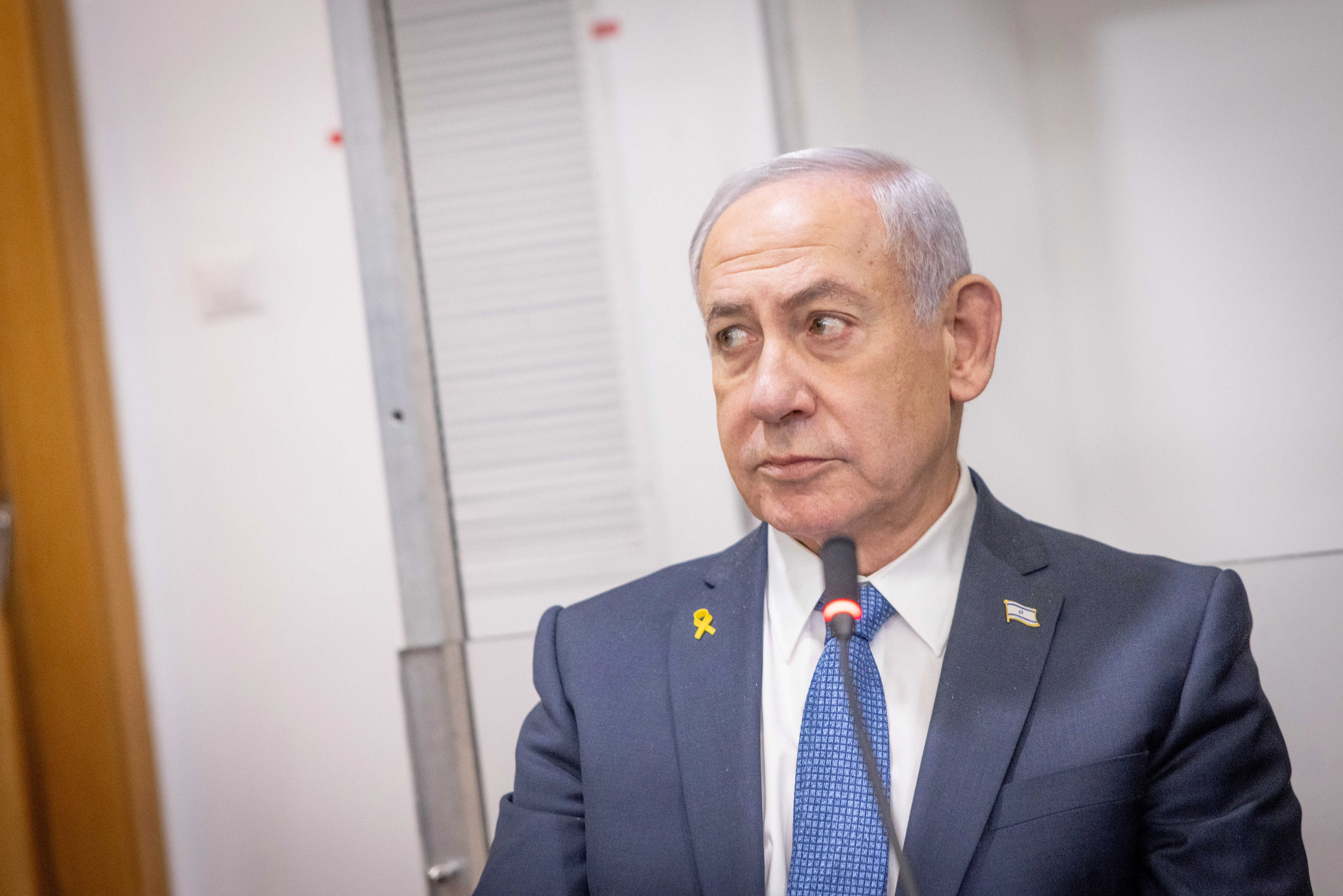 Israeli Prime Minister Benjamin Netanyahu arrives to the courtroom at the Distrcit court in Tel Aviv, before the start of his testimony in the trial against him, March 31, 2025. Photo by Miriam Alster/Flash90