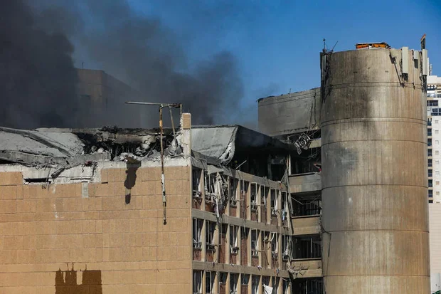 Smoke rises from the scene where a ballistic missile fired from Iran hit and caused damage at the Soroka Medical Center in Be'er Sheva, June 19, 2025. Photo by Dudu Greenspan/Flash90