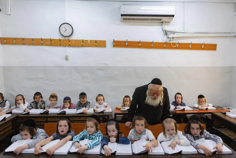 Young ultra-Orthodox Jewish students study in a classroom at the opening of the new school year, at a heder in the ultra-Orthodox Mea Shearim neighborhood of Jerusalem, August 25, 2025. Photo by Chaim Goldberg/Flash90