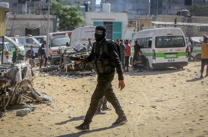 Masked members of the Palestinian Hamas movement arrest several members of Yasser Abu Shabab, who are accused of collaborating with the Israeli army in the Gaza Strip, according to Hamas members, in the southern Gaza Strip. Photo by Saeed Mohammed/Flash90.