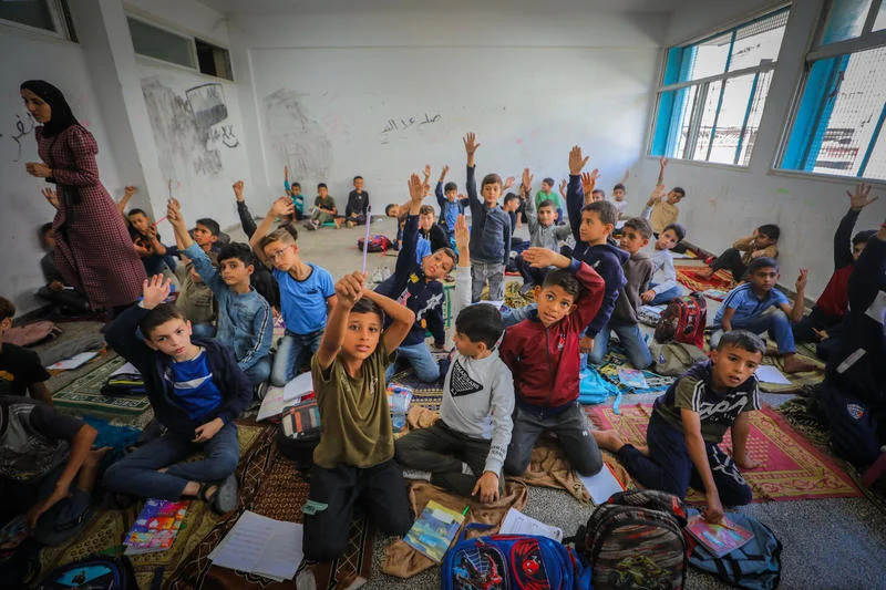 Palestinian children return to school following the ceasefire between Israel and Hamas in Gaza City, October 26, 2025. Photo by Ali Hassan/Flash90