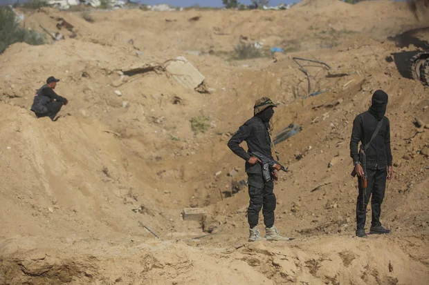 Heavy machinery works alongside members of Saraya al-Quds and teams affiliated with the Egyptian delegation as they search beneath the rubble for the remains of an Israeli hostage in the Nuseirat neighborhood of Gaza City, November 21, 2025. Photo by Ali Hassan/Flash90