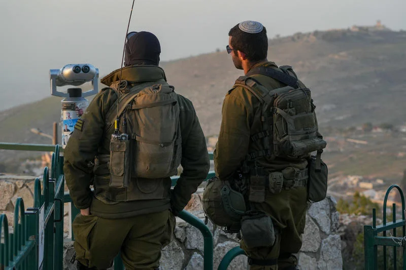 Israeli soldiers observe southern Lebanon from a lookout point near the Israeli border, January 25, 2026. Photo by Ayal Margolin/Flash90