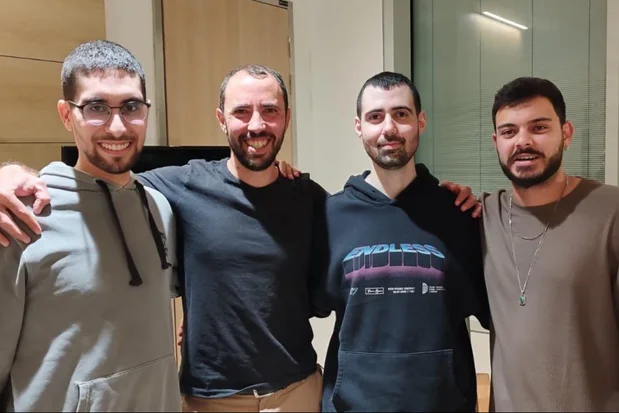 Evyatar David, Tal Shoham, Guy Gilboa-Dalal, and Omer Wenkert, reunited on October 18, 2025. (Photo: Screenshot/X, used under Section 27A of the Copyright Act)