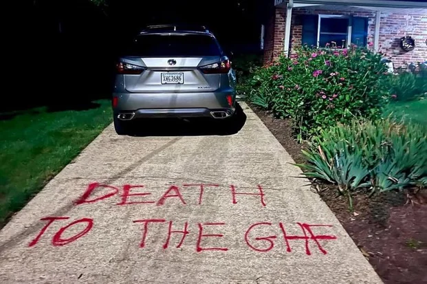death threat graffiti reading “Death to the GHF” outside the Virginia home of Gaza Humanitarian Foundation (GHF) acting director, John Acree. Aug 12, 2025. Photo: (Photo used under section 27A of the copyright law).